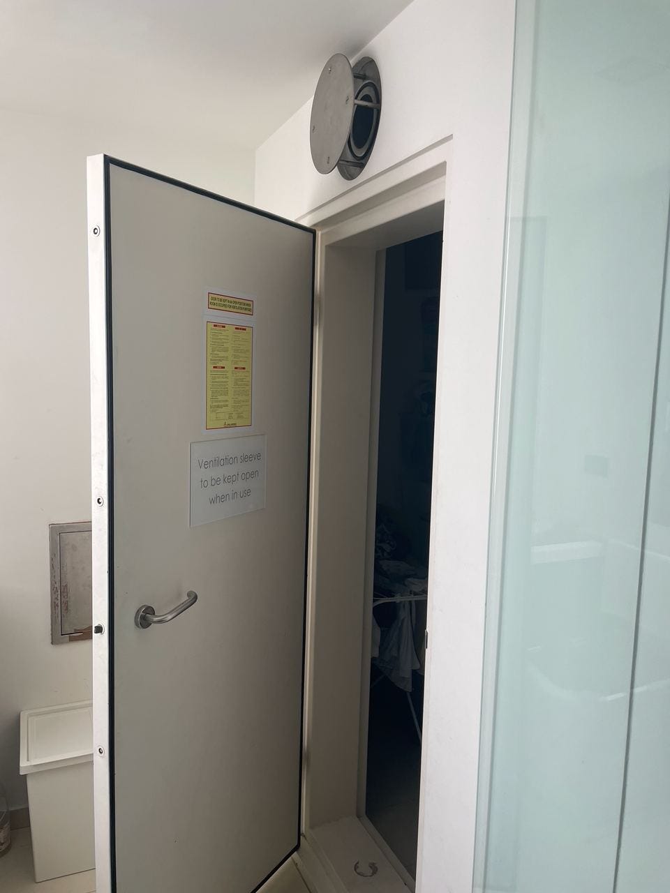 Steel door of a household shelter in a Singapore condo