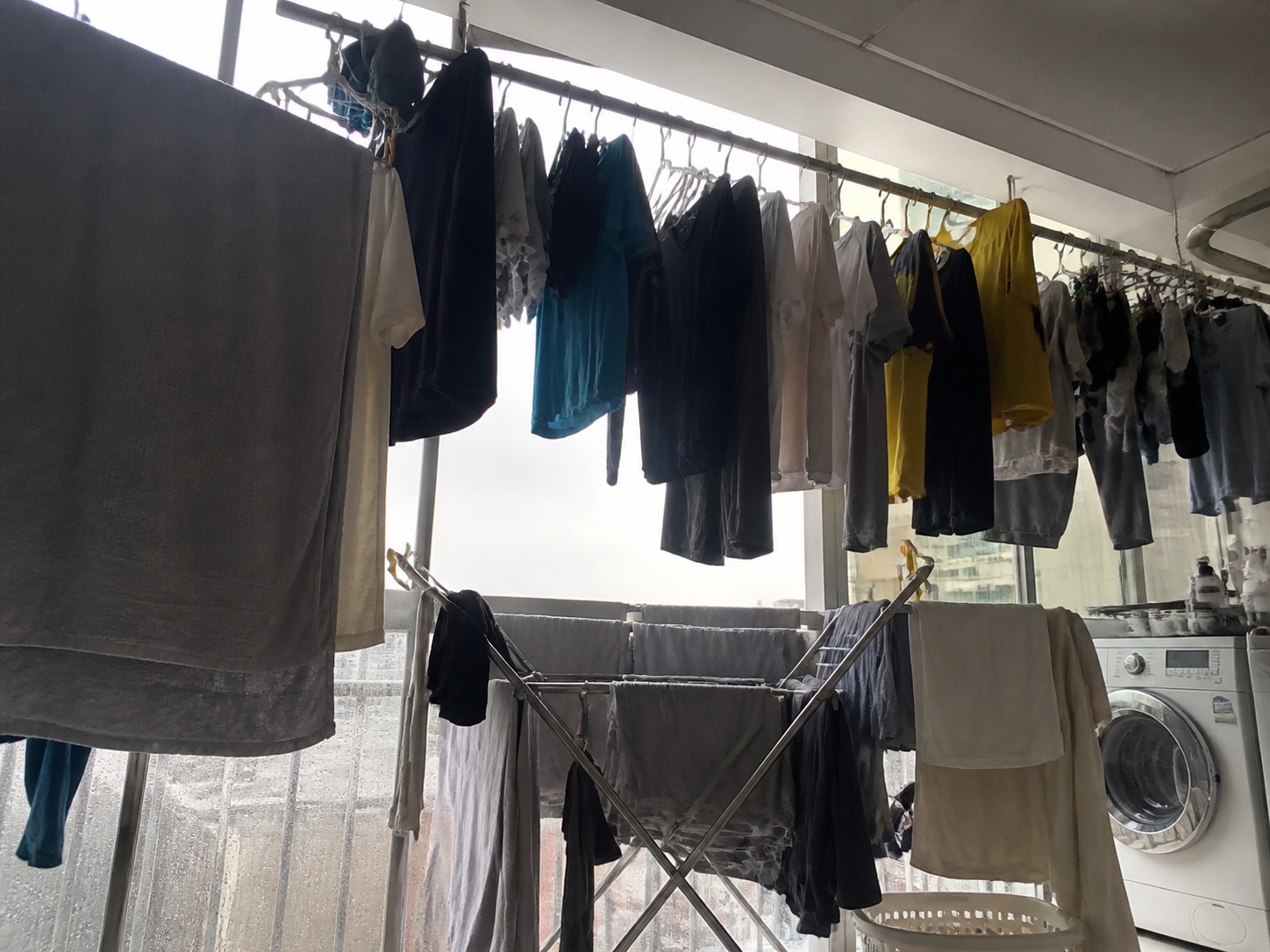 Fresh laundry drying inside a Singapore apartment