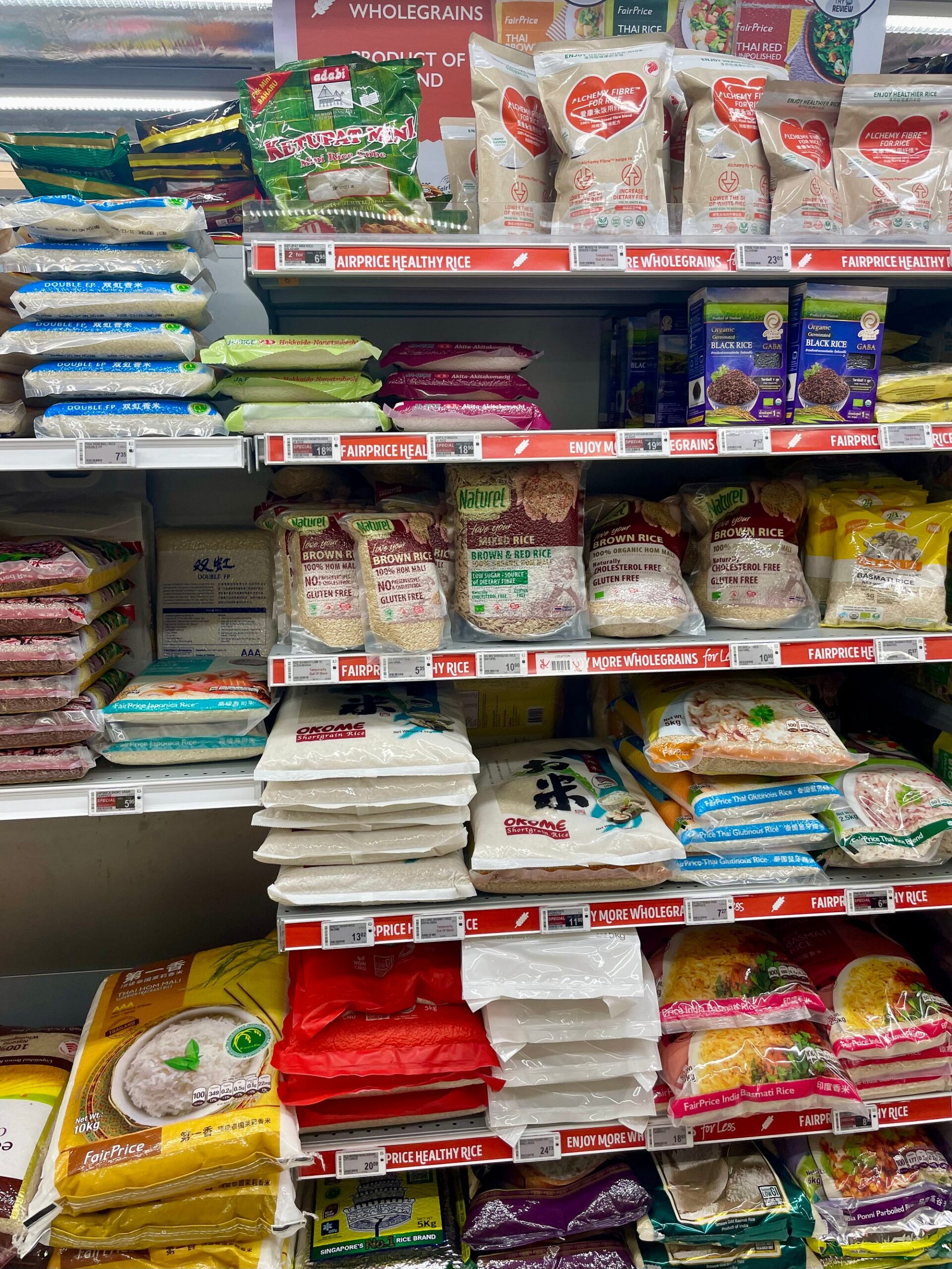 Shelves of rice varieties at FairPrice Finest