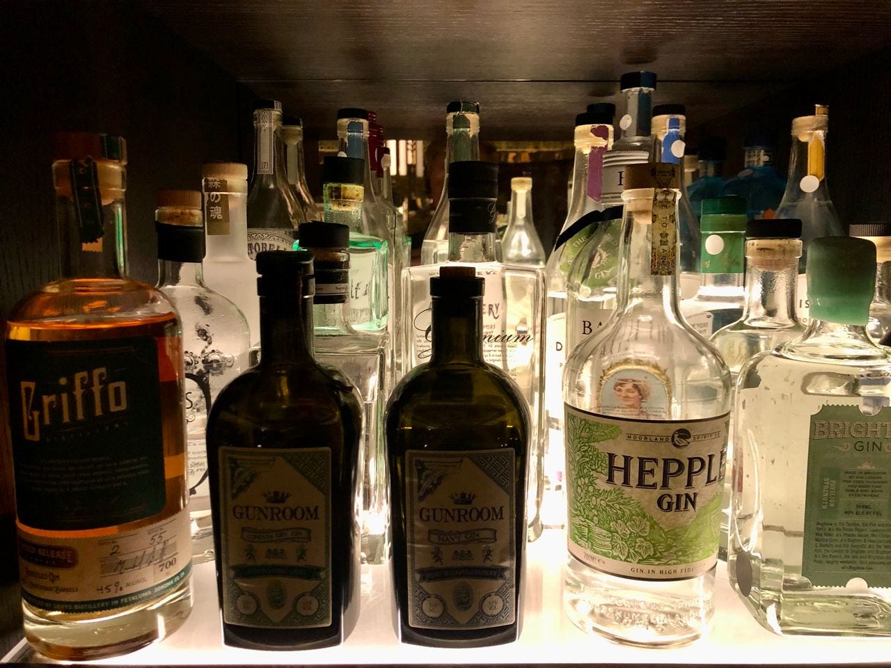 Assorted gin bottles at Atlas Bar
