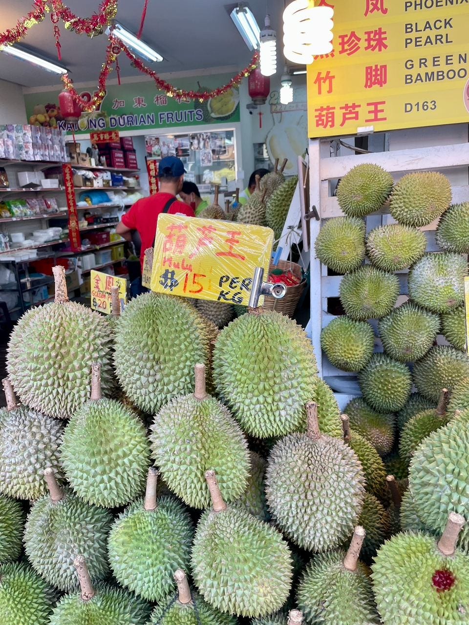 Durians for sale at a fruit stall