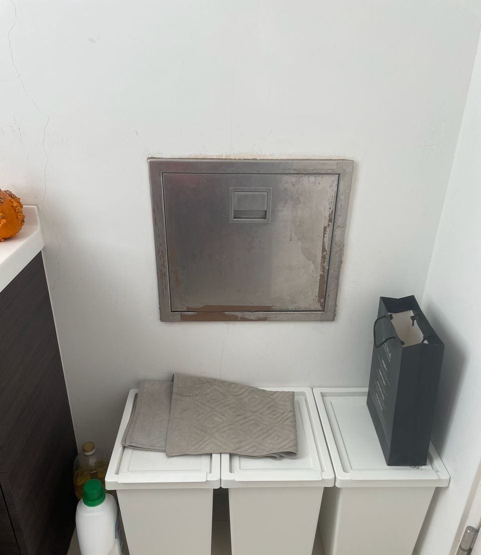 Garbage chute inside a Singapore kitchen