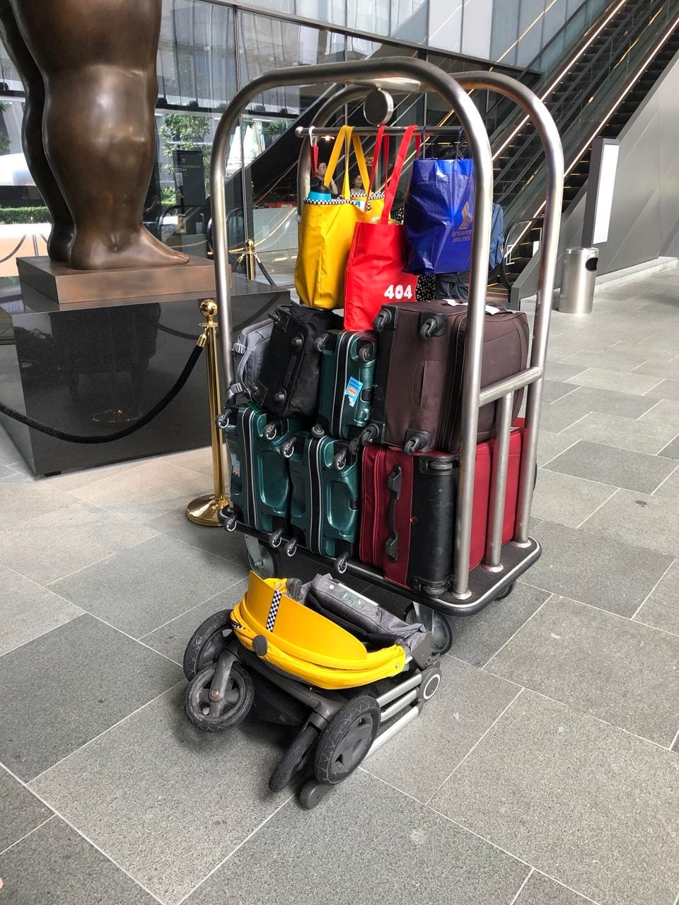Suitcases used for a family move to Singapore