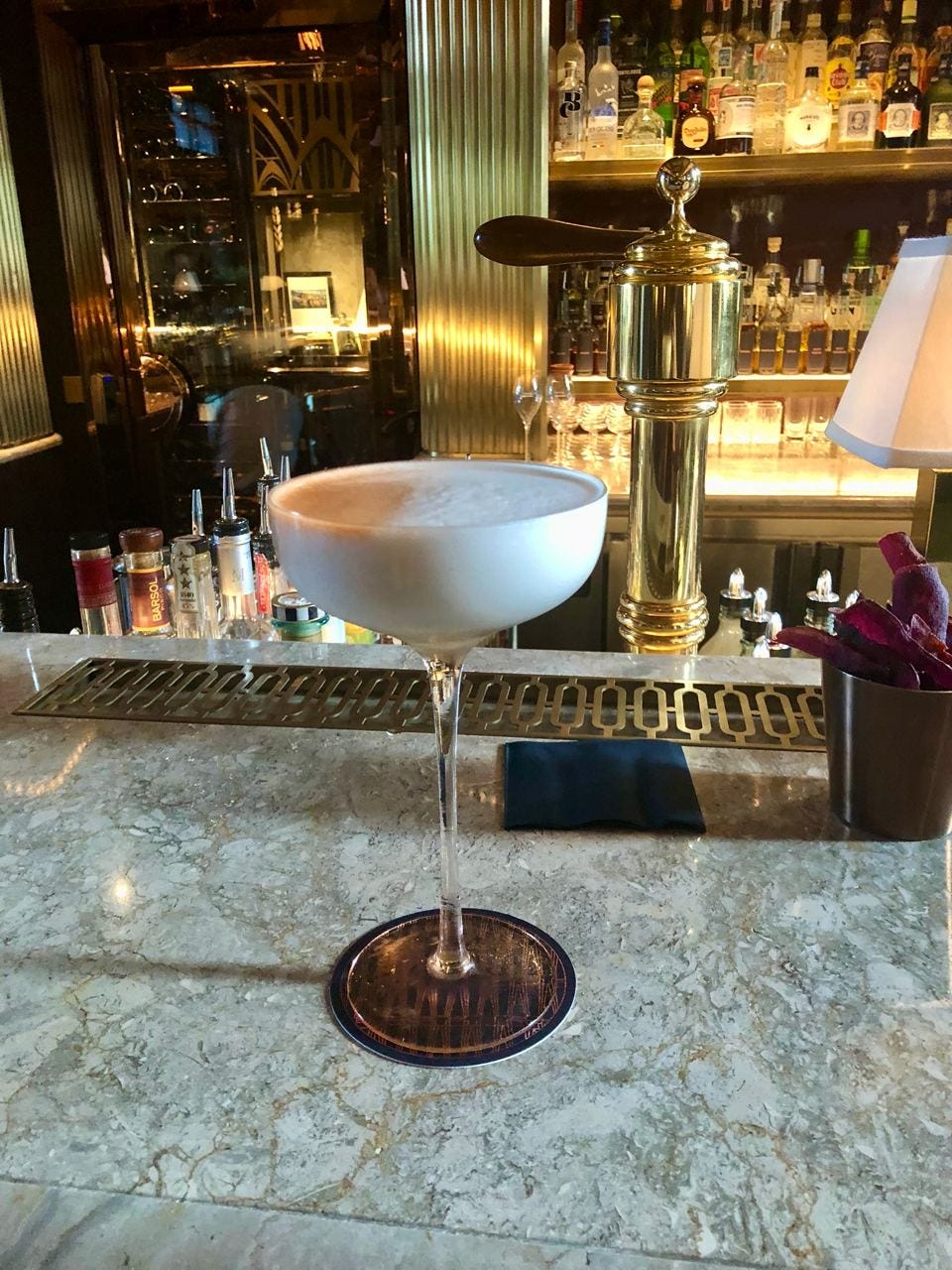 Cocktail served on the Atlas Bar counter