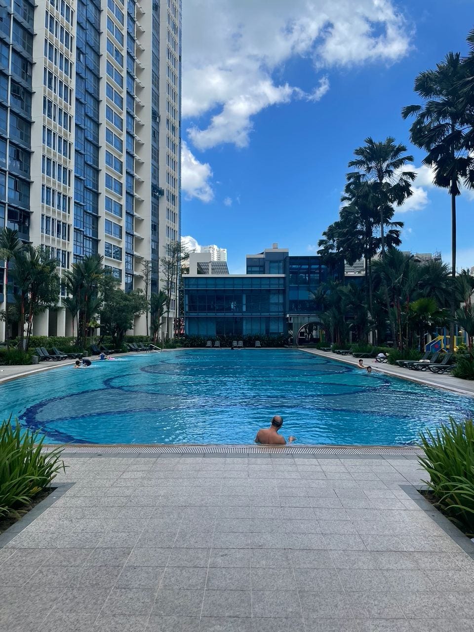 Swimming pool and towers at City Square Residences