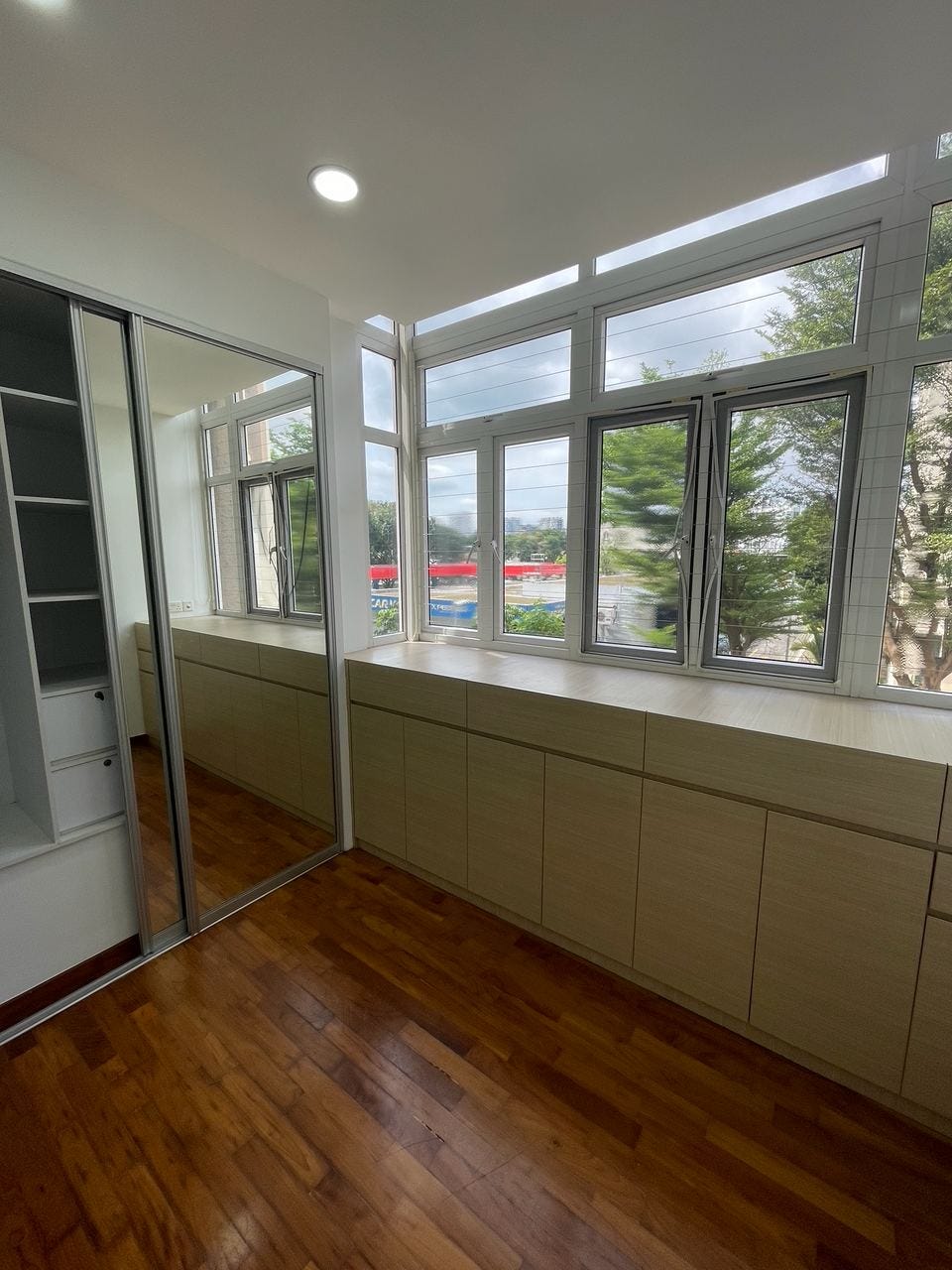 Small bedroom or study with wooden flooring