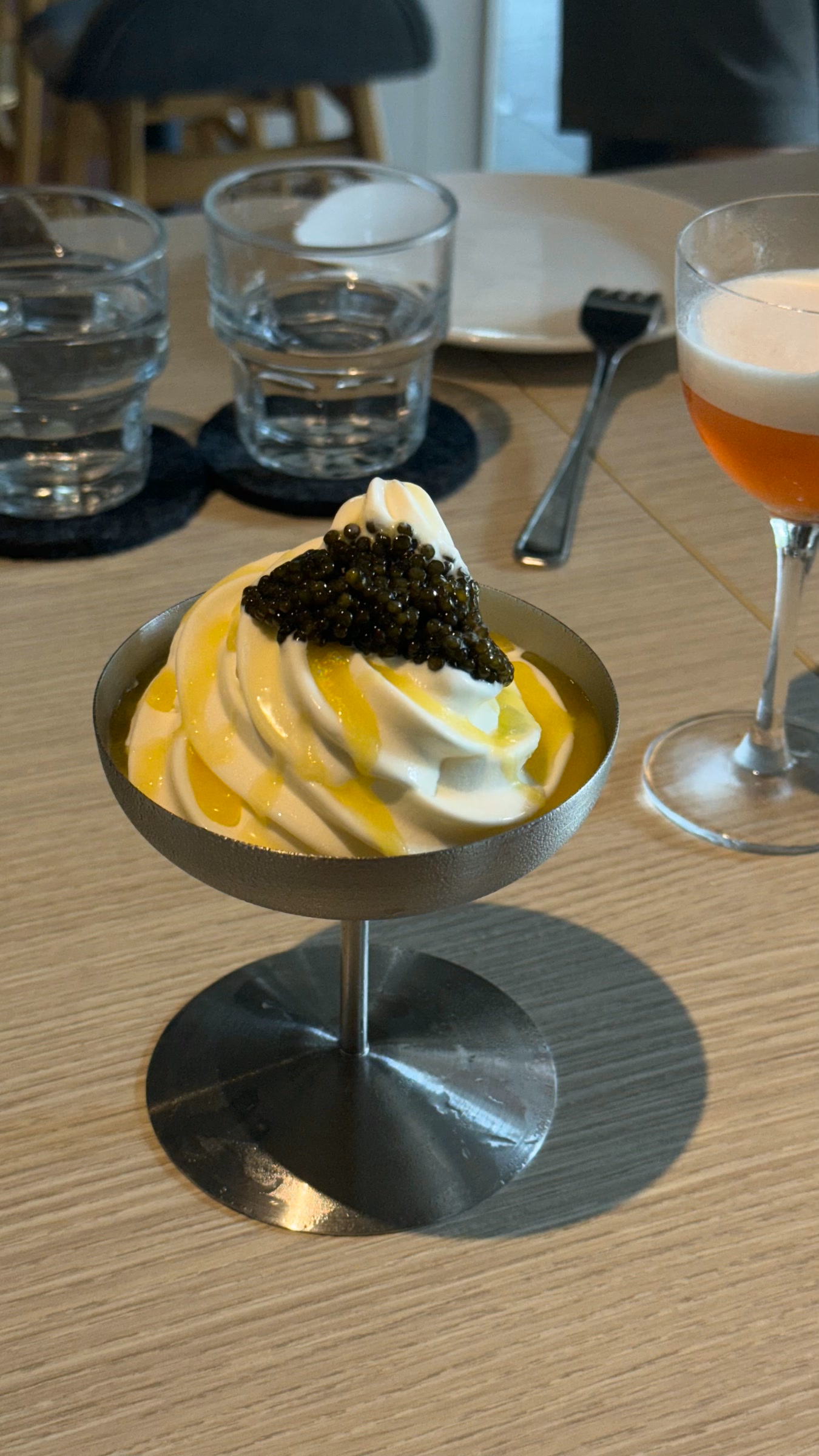 Fior di Panna soft serve topped with Oscietra caviar and olive oil