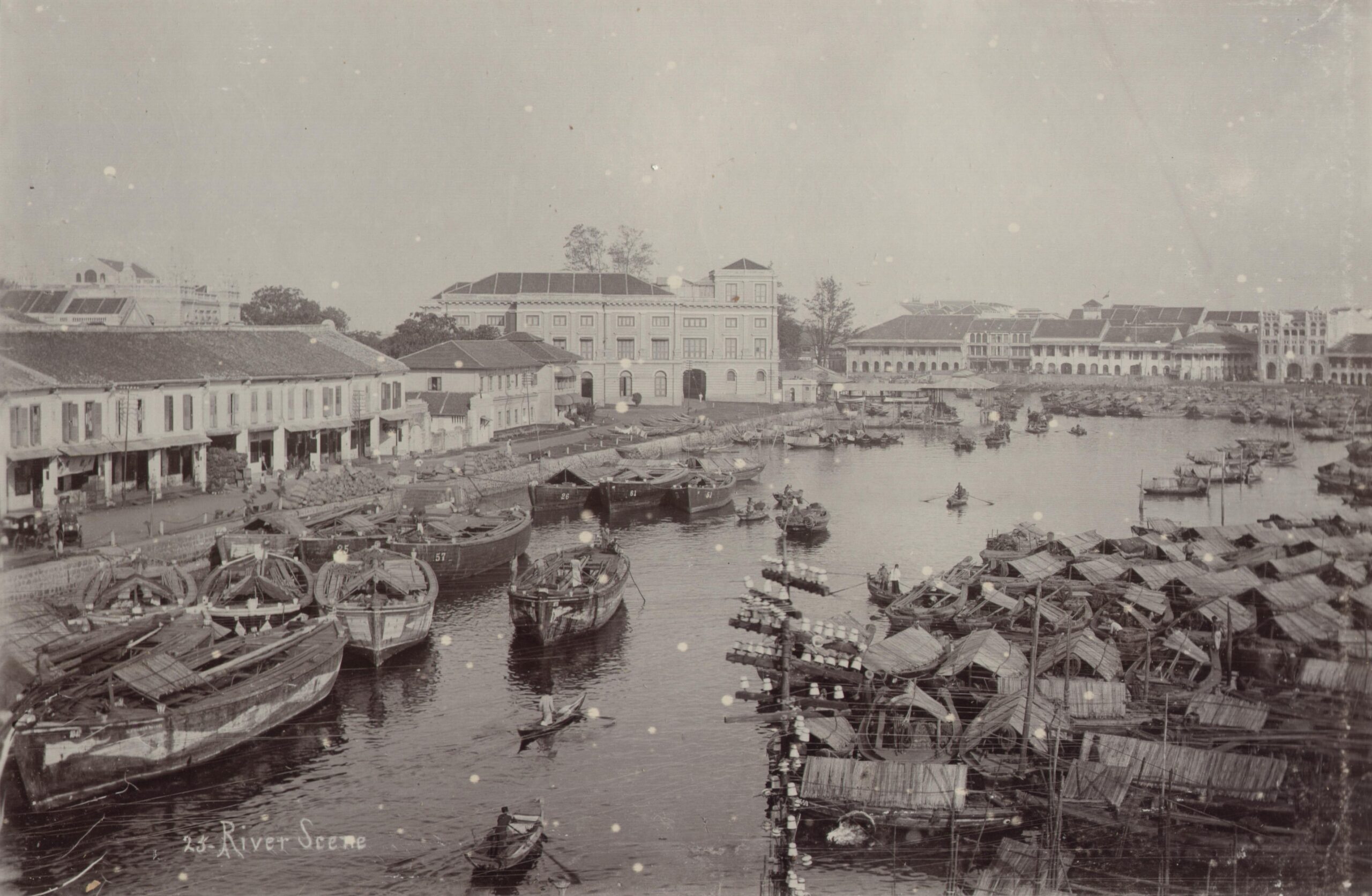 Bumboats crowd the Singapore River and port around 1900