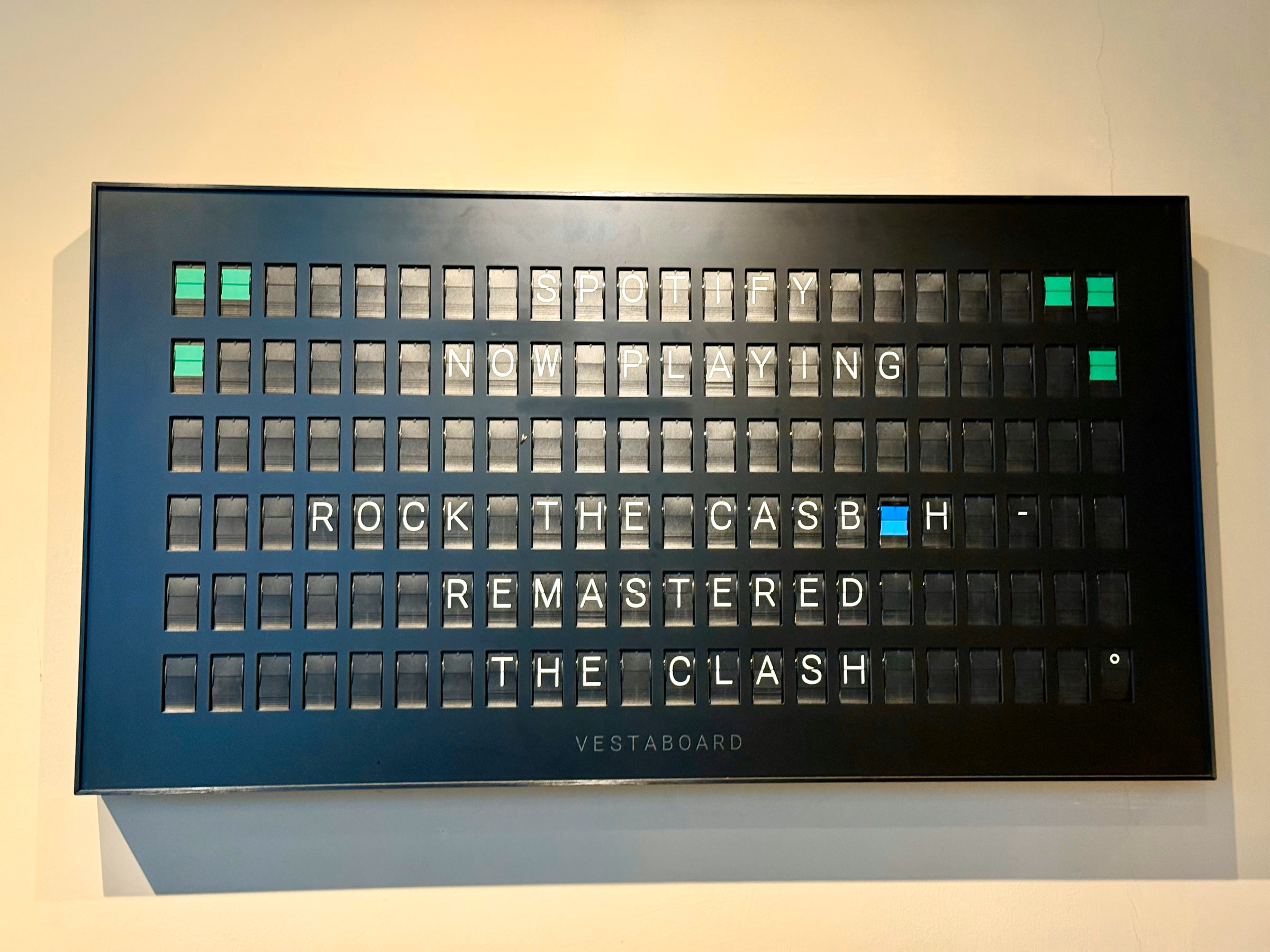 Mechanical Vestaboard showing a Spotify track by The Clash